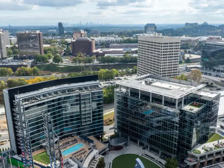 Aerial view of modern office buildings in a city skyline.